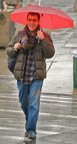 Happy man in a rainy day (2009). Photo: Ed Yourdon. Source: http://commons.wikimedia.org/wiki/File:Happy_man_in_a_rainy_day.jpg