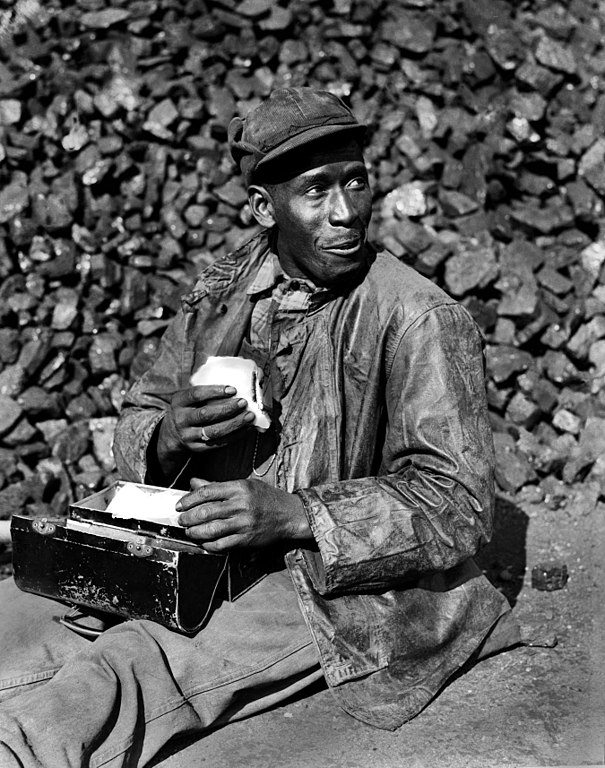 Coal worker in coal yard, Oak Ridge, Tennessee 1945. DOE photo.