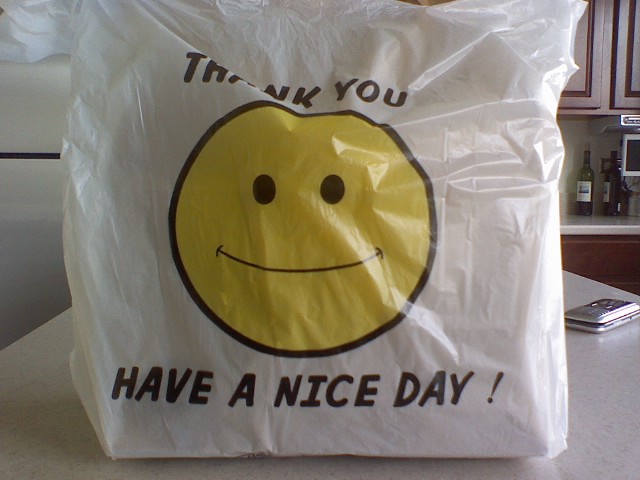 A bag with a smiley face design that bids the viewer "Thank you" and "Have a nice day!" (2009).