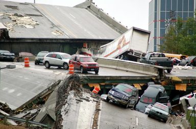 Cars rest on the collapsed portion of I-35W Mississippi River bridge, after the August 1st, 2007 collapse.