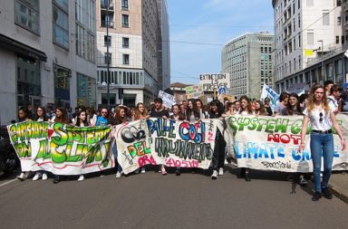 Students holding banners, School strikes for climate - Fridays For Future in Milan, Italy