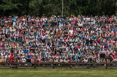 Crowd watching a sports event. Audience, Merfelder Bruch, Dülmen, North Rhine-Westphalia, Germany; Wildpferdefang 2014