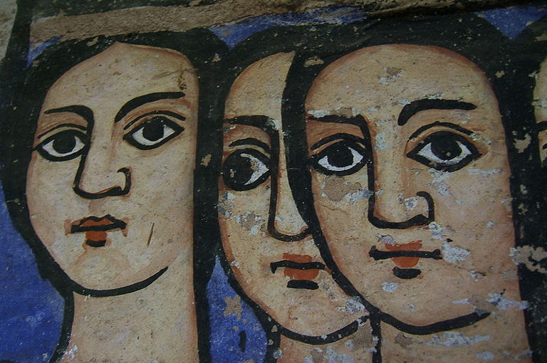 Three Faces on a Wall
