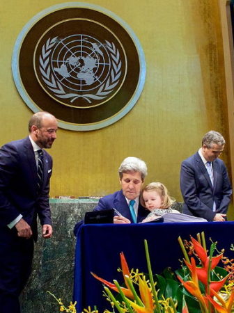 John Kerry signing Paris climate accord