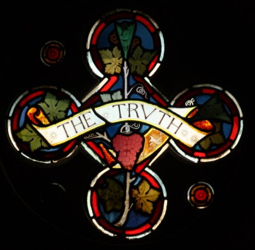 Chancel window in UK saying "Truth"