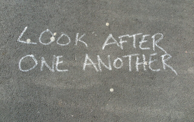 Look after each other graffiti