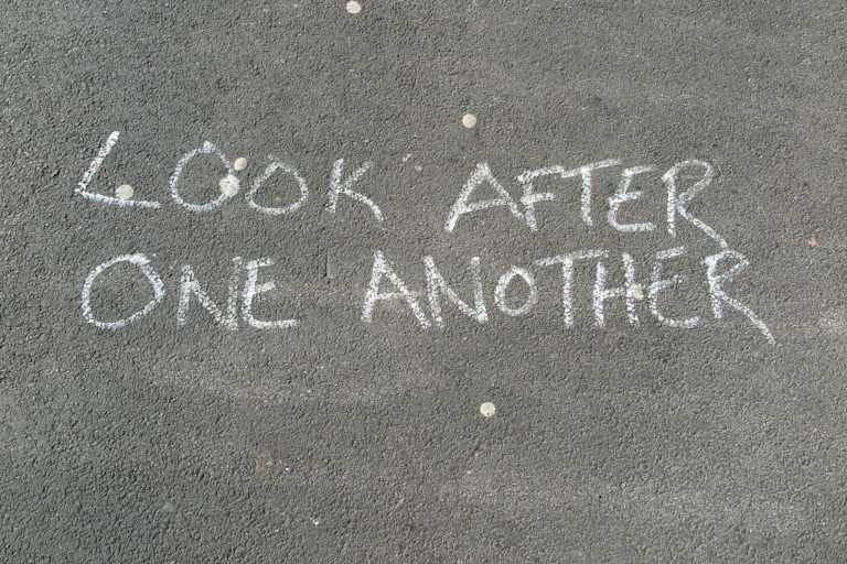 Look after each other graffiti