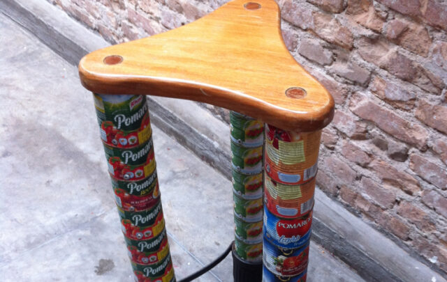 Food cans repurposed as stool