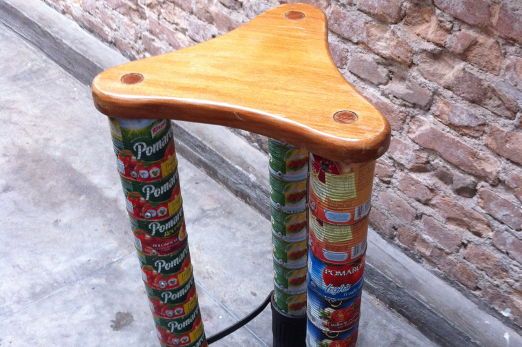 Food cans repurposed as stool