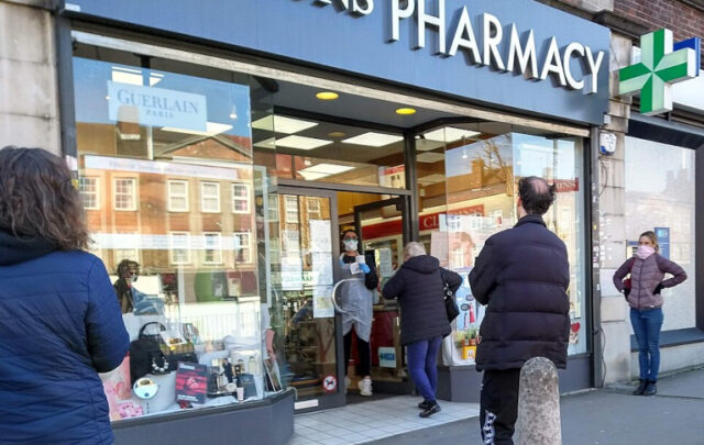 Social distancing at UK pharmacy in March 2020