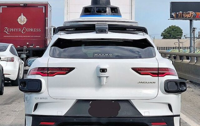 Waymo car on a freeway