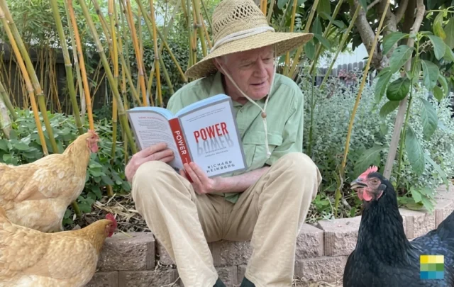 Richard Heinberg reading his book 'Power' to his chickens.