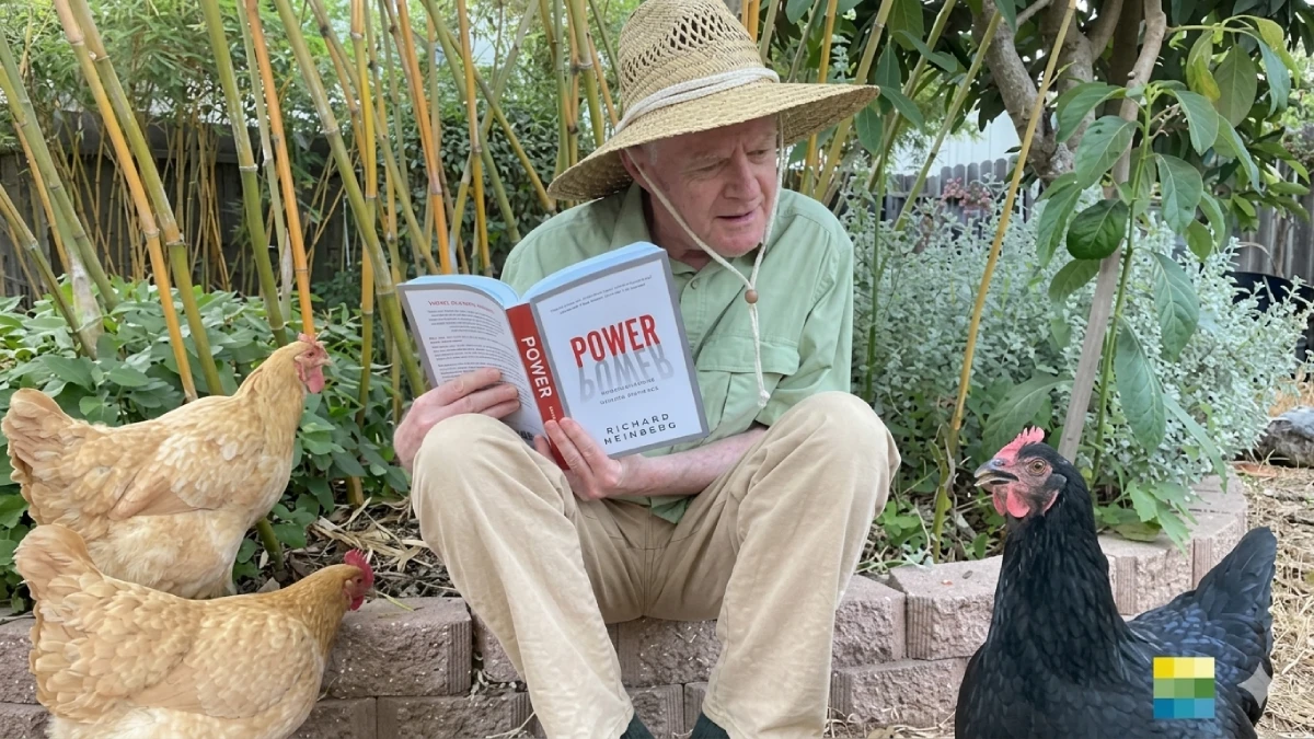 Richard with Chickens hi-res Richard Heinberg reading his book 'Power' to his chickens.